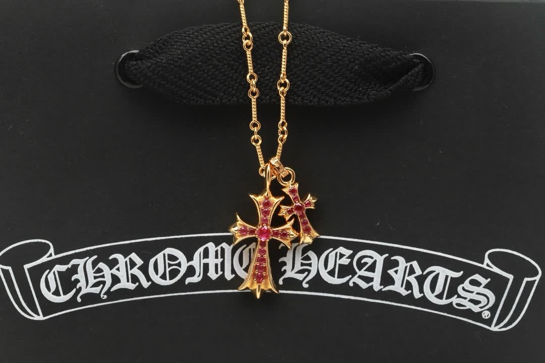 Chrome Hearts Gold Cross Pendant with Pink Stones